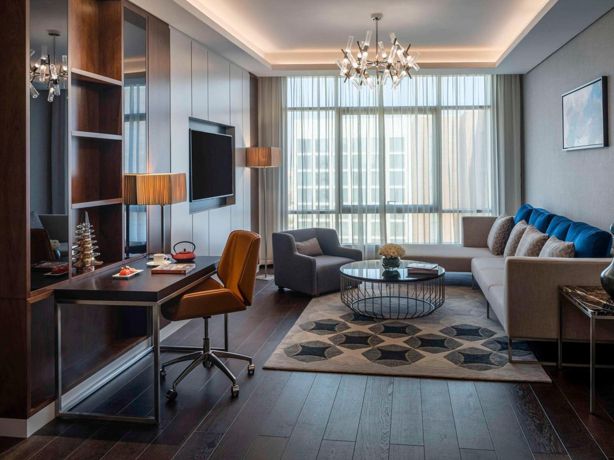 Movenpick Hotel And Residences Ер-Ріяд Екстер'єр фото A living room at the hotel